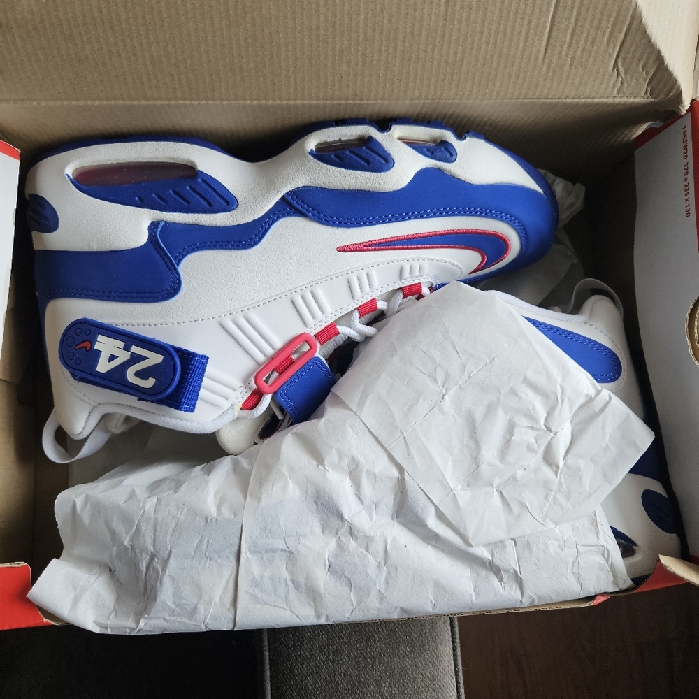 Nike Blue and White Sneakers with Pink Accents